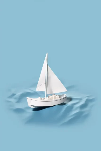 白色的船漂浮在精致的纸剪裁风格