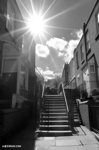 黑色和白色的街道照片与楼梯在阳光下